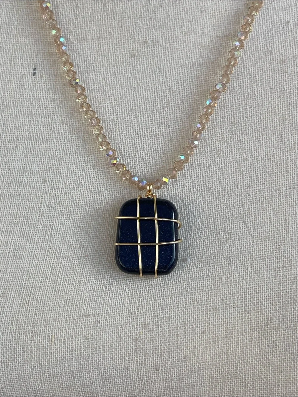 Navy Blue Gold Stone Necklace Gold Tone Wire Wrapping and Champagne Glass Beads